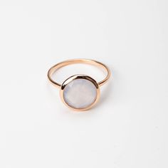 Gemstone ring with Chalcedony natural gemstones in 14K solid gold. A modern and delicate stacking gold ring. A perfect gold ring for women, dainty and subtle that adds glam to every outfit. The best gift for her. 100% handcrafted with love! D E T A I L S ● Metal: 14K solid gold, 14K white gold or 14K rose gold ● Gemstone: Chalcedony, briolette cut ● Stone Diameter: 8mm (0.31in), 10mm (0.4in) and 12mm (0.5in) R I N G ∙ S I Z I N G For General Reference: ● we use standard US Ring Sizing ● an avera Everyday Rose Gold Gemstone Rings, Elegant Faceted Birthstone Ring In 14k Gold, Elegant Stackable Rose Gold Birthstone Ring, Classic Rose Gold Stackable Gemstone Rings, Classic Rose Gold Stackable Rings With Gemstones, Modern Stackable Moonstone Ring For Gift, Elegant Gemstone Stackable Rings For Everyday, Modern Stackable Moonstone Ring Gift, Delicate Gemstone Stackable Rings