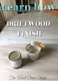 a paint can and brush sitting on top of a wooden table with the words learn how to create a painted driftwood finish