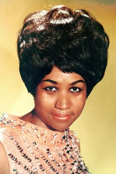 an old photo of a woman with short hair and sequins on her head