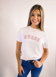 My absolute favorite tee! This 'NURSE' tee can be customized to your preferred thread color and is stitched on a Comfort Colors short sleeve unisex tee.  Please wash on gentle cycle and dry on low.  If you are wanting a different design, wording, or a different clothing style, please send me a message so we can discuss the details. Please include thread color at checkout If you need this order rushed, please add these to your cart: https://www.etsy.com/listing/1043569716/rush-my-order-for-t-shirts?ref=shop_home_active_19&frs=1 Rush my order + Priority shipping, click here: https://www.etsy.com/listing/1043567696/rush-my-order-priority-shipping-for-t?ref=shop_home_active_35&frs=1 Graphic Tee With Embroidered Graphics For College, Short Sleeve Tops With Embroidered Graphics For College, Short Sleeve Tops With Graphic Embroidery For Everyday, Short Sleeve Tops With Embroidered Graphics For Everyday, Casual Nursing Top With Crew Neck, Embroidered Short Sleeve T-shirt For College, Everyday Crew Neck Tops With Embroidered Graphics, Crew Neck Top With Embroidered Graphics For Everyday, White Embroidered T-shirt For College