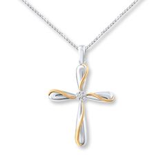 A cluster of diamonds sparkles at the center of a cross fashioned in sterling silver accented by ribbons of 10K yellow gold in this religious necklace for her. The pendant suspends from an 18-inch box chain secured with a lobster clasp. Fine Jewelry Cross Necklace With Diamond Accents For Anniversary, Fine Jewelry Cross Necklace For Anniversary, Anniversary Diamond Pendant Cross Necklace, White Gold Cross Charms For Anniversary, White Gold Cross Necklace With Diamond Accents For Anniversary, Anniversary White Gold Cross Necklace With Diamond Accents, Diamond Cross Necklace, Sterling Silver Cross Necklace, Sterling Silver Cross Pendant