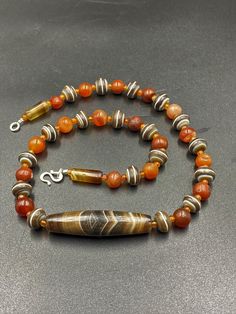 The beautiful banded agate and carnelian beads necklace with good conditions Beautiful combination and beautiful collection make into one mala necklace we provide fast and free shipping to our customers by which you can get the item maximum 7 working days Traditional Agate Bead Necklace 8mm, Carnelian Round Bead Necklaces For Meditation, Tibetan Necklace, Rare Beads, Green Jasper, Beads Jewellery, Gold Rings Jewelry, Wooden Necklace, Jasper Necklace