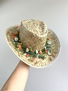 Summer Festival Sun Hat embellished with silk wild flowers  Perfect to shade you from the sun whilst enjoying a Pims at the garden party! Hat made from: Natural reeds woven into a straw styles sun hat One size FREE UK DELIVERY Adjustable Summer Sun Hat With Flower Design, Adjustable Summer Sun Hat With Flower Shape, Adjustable Summer Flower Sun Hat, Bohemian Adjustable Sun Hat For Garden Party, Adjustable Bohemian Sun Hat For Garden Party, Spring Festival Costume Hat With Short Brim, Whimsical Adjustable Sun Hat For Summer, Whimsical Brimmed Sun Hat For Summer, Bohemian Flower Sun Hat For Beach