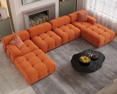 an orange sectional sofa sitting on top of a gray rug