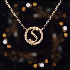 "The pendant measures 3/8\" (0.375\"). The weight of the 14k gold is 2.1 grams. There are 14 hand-selected, brilliant cut, G color, round diamonds in the halo with a total weight of 0.07 carats. This completely customizable necklace comes with your choice of initial, in your choice of 14k yellow, rose, or white gold, and on the chain length of your choice! We can even make the chain adjustable between two lengths (for example 16\" --> 18\"), if you would like this option please choose \"adjus Elegant Diamond Monogram Initial Necklace, Diamond Initial Necklaces, Initial Diamond Necklaces, Rose Gold Initial Pendant Necklace, Round Diamond Initial Necklaces, Gold Initial Necklace With Diamond Accents, Round Cubic Zirconia Initial Necklaces, Luxury Rose Gold Initial Pendant Necklace, Initials Cubic Zirconia Round Necklace