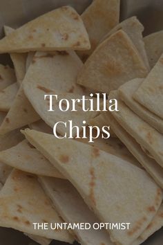 tortilla chips in a bowl with the words tortilla chips