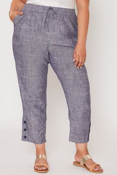 Our comfy Women's Pull On Button Hem Pants are a fantastic addition to your year round wardrobe. Featuring a wide-width waistband, elastic waistband, drawstring feature, and 3 button hem detail. Measurement (Based on size 2X)- Inseam: 25"- Rise (To top edge of band): 14.5"- Leg Opening: 18" 52% Linen/ 48% Viscose