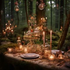 a table topped with lots of candles and dishes