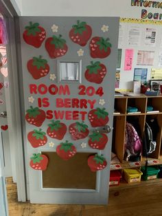 a door decorated with strawberries and the words room 20 is berry sweet