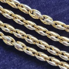 A fine quality necklace from Italian luxury designer Chimento, the fancy links made in 18ct yellow and white gold, fastened by a lobster claw clasp, with Chimento's stamp. Circa 2000's. With Italian (Vicenza) marks for 18ct gold. The chain measures approximately 500mm / 20 inches (L) x 4.9mm (W). The approximate weight is 25.9 grams. Please note that the antique box pictured is for display purposes only. Thank you. CONDITION: In very good vintage condition, with minimal surface wear commensurate with age. The clasp functions perfectly. LAYAWAY: We happily offer layaway/deposits on the majority of our items. Please send us a message if you would like to arrange a layaway. Layaways are not available on sale items. SHIPPING: All items are packed in a gift box and are sent securely within 1-3 Luxury Chain Necklace With Lobster Clasp For Formal Occasions, Luxury Chain Necklace With Lobster Clasp For Formal Events, Yellow Gold Polished Chain Link Necklace, Formal Chain Link Necklace With Polished Finish, Hallmarked Yellow Gold Oval Link Chain Necklace, Elegant Formal Chain Necklace With Lobster Clasp, Hallmarked Yellow Gold Link Chain Necklace, Elegant Hallmarked Link Chain Necklace, Formal Gold Bracelet With Wheat Chain