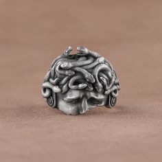 Broken Medusa Head Signet Ring, Oxidized Sterling Silver Mens Statement Ring, Gorgon Medusa Mythology Ring for Him, Unique Thumb Rings Made of 925 silver and handcrafted by hand, this ring is not only an accessory piece that complements your daily elegance, but also has details that will reflect your character and style. It is also a great gift to give to your loved ones on their special days. At SavisSilver, we always give importance to the satisfaction of our customers, we recommend you to rea Medusa Mythology, Gorgon Medusa, Medusa Head, Sterling Silver Mens, Thumb Rings, Family Heirloom, Oxidized Sterling Silver, Signet Ring, Statement Ring