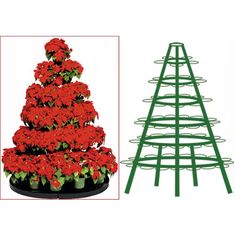 a christmas tree with red flowers in it and a potted plant next to it