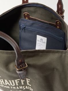 the inside of a duffel bag with two pockets and a label on it that says hauffe san francisco