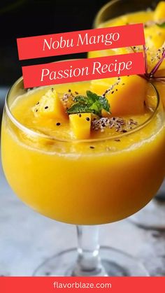 two glasses filled with orange juice and garnished with pineapple