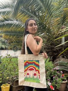 *please message me before placing order  *pictured bag is just an example but I can make a bag like it if you choose :-) * TOTE BAG IS: -- 15 x 16" in size -- Made of 100% 5 oz natural cotton -- Eco-friendly reusable bag, perfect for any occasion, good for carrying books, going to the beach, etc HOW IT WORKS: -- wait time is 1-2 weeks unless I say otherwise. -- designs painted with a mixture of acrylic and fabric medium. -- Upon purchase I will draw out a design (by pencil) and send you a pictur Natural Canvas Gift Bag, Canvas Satchel Bag As Gift, Eco-friendly Large Shoulder Bag As Gift, Square Canvas Shoulder Bag Gift, Square Canvas Shoulder Bag For Gift, Handmade Canvas Satchel Bag, Artsy Handmade Tote Bag, Square Canvas Shoulder Bag Perfect For Gifts, Handmade Artsy Tote Bag