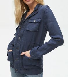 Classic fit linen jacket with a zip up and button closure. Hip-length jacket with four front pockets and drawstring to cinch in waist. Details 100% Linen Machine Washable Slightly Relaxed Fit/ TTS Linen Jacket, Anorak Jacket, Michael Stars, Military Inspired, Light Sweater, Utility Jacket, Outerwear Women, Linen Fabric, Vest Jacket