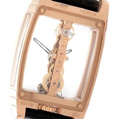 Corum Golden Bridge Classic Rose Gold Skeleton Mens Watch B113/01043. Manual-winding decorated linear movement.  Caliber CO 113. 19 Jewels. 18k rose gold tonneau sceleton case 34.00 x 51.00 mm. Transparent case back. The crown is located at the 6 o'clock position and is engraved with the Corum key. . Scratch resistant sapphire crystal. See thought Transparent  dial with skeleton rhodium-plated baton hands. Black leather strap with 18k rose gold tang buckle. Gold Skeleton, Golden Bridge, Iwc Watches, Rolex Date, Swiss Watches, Luxury Watch, Sapphire Crystal, 18k Rose Gold, Rhodium Plated