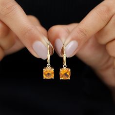 Product Details Make her special day even more memorable with these gorgeous Gold Drop Earrings. These Solitaire Earrings are adorned with a Cushion Cut Citrine set in a prong setting, and the lever back gives them a charming and captivating appeal. Give the gift of timeless beauty and elegance with these Citrine Earrings. Product Information SKU SHP-EARRINGS032210996 Weight 2.00 gm (Approximate) CITRINE INFORMATION No.of Stones 2 Pieces Total Weight 4.46 Carat (Approximate) Dimension(approx) Cu Citrine Earrings, Solitaire Earrings, Signature Jewelry, Timeless Jewelry, Gold Drop Earrings, Conflict Free Diamonds, Cushion Cut, The Gift, Free Jewelry