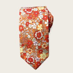 Treat yourself with a new pattern and splash of color to your look with this unique tie set. 100% Cotton Handmade Package Includes: Slim Tie Length: 57" Width: 2.6" Warm iron if needed Red Tie As A Summer Gift, Multicolor Standard Tie For Summer, Fitted Neckwear For Summer Gifts, Summer Neckwear As Gift, Summer Floral Print Tie, Summer Floral Print Standard Tie, Multicolor Summer Ties For Formal Occasions, Adjustable Multicolor Standard Tie, Red Adjustable Standard Tie