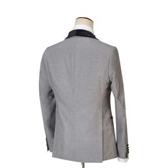 Package Includes: 1 x Jacket - 1 x Waistcoat - 1 x Pant

Experience sophistication with our grey tuxedo, tailored from fine 120s fabric with silk lining and half canvas construction. It showcases a plain pattern, complemented by black velvet buttons, a shawl lapel, and a U-shape double-breasted waistcoat, making it an impeccable choice for all seasons.

 	Fabric: 120s 
 	Lining Fabric: Silk
 	Pattern: Plain
 	Buttons: Black Velvet Fabric
 	Construction: Half Canvas
 	Seasonality: All Season
 	Ja Gray Notch Lapel Tuxedo For Formal Events, Gray Notch Lapel Tuxedo For Formal Occasions, Gray Notch Lapel Tuxedo For Semi-formal Events, Gray Notch Lapel Tuxedo For Semi-formal Occasions, Gray Tuxedo Blazer With Notch Lapel, Gray Tuxedo Suit For Formal Occasions, Semi-formal Gray Tuxedo With Notch Lapel, Gray Notch Lapel Tuxedo, Tailored Gray Tuxedo For Formal Occasions