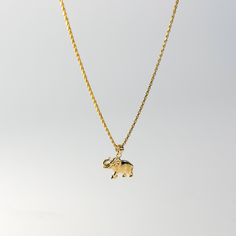 Get guidance and intellectual power in the most sophisticated way. Stories say that when you encounter an elephant in real life, the media, or in your dreams, it is a reminder that you have the intellectual capacity to solve the problems blocking your way. The elephant has long been associated with wisdom and strength. We created a beautiful 14K solid gold pendant of this beautiful creature for you to wear. This handmade gold elephant pendant showcases excellent craftsmanship through the intrica Gold Elephant Pendant, Elephant Necklace Gold, Diy Necklace Display, Gold Elephant, Elephant Necklace, Necklace Display, Elephant Pendant, An Elephant, Necklace Charm