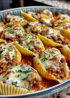 a casserole dish filled with meat and cheese