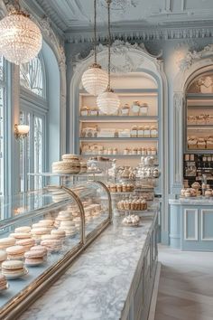 a bakery filled with lots of cakes and cupcakes