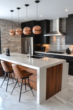 Modern kitchen with a large island, marble countertops, wooden accents, and three pendant lights. Double Sided Kitchen Island, Modern Island Kitchen, Floating Kitchen Island, Metal Kitchen Island, Functional Kitchen Island, Green Kitchen Island, Distressed Kitchen, Blue Kitchen Island