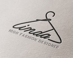 the logo for high fashion designer is shown on top of a piece of white paper