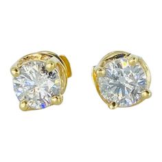 Vintage 2.00 Carat Total Diamonds Stud Earrings Patented Backing 14k. The diamonds color are H/I & clarity are SI2-SI3 very nice pair of studs. The center diamond each weight approx 0.76 carat and surrounding diamonds 16 stones X 0.03ct = 0.48 carat for a total of 2.00 carat diamonds. The prong setting is a swivel designed and is extremely elegant. The side diamonds compliment the center diamonds and bring out maximum sparkle and shine! The earrings are accompanied by patented back closure for m Fine Jewelry Multi-stone Round Diamond Earrings, Luxury Gold-plated Multi-stone Earrings, Luxury Multi-stone 14k Gold Earrings, Luxury Diamond-cut Cubic Zirconia Cluster Earrings, Multi-stone Cubic Zirconia Round Earrings, Diamond Earrings Studs, Diamond Studs, Prong Setting, Jewelry Earrings Studs