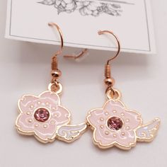 Handmade Earrings Style: Winged Sakura Earrings Comes With Organza Bag New Makes A Great Gift For Any Occasion Or Holiday! Don't Forget To Check Out My Other Styles! Keywords: Kawaii, Anime, Sakura, Winged, Present, Hanging, Earring, Drop, Birthday, Gift, Handmade, Made In Usa, Nj Artist, Female Owned, Artisan, Craft Rose Gold Flower Shaped Jewelry For Spring, Rose Gold Flower-shaped Jewelry For Spring, Rose Gold Drop Flower Earrings For Spring, Pink Dangle Flower Earrings Gift, Pink Dangle Flower Earrings For Gift, Rose Gold Drop Earrings For Spring, Spring Rose Gold Drop Earrings, Pink Dangle Flower Earrings Nickel Free, Nickel-free Pink Dangle Flower Earrings