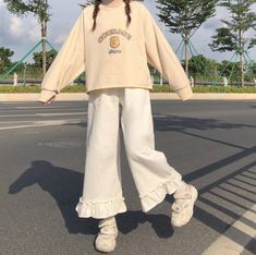 Brand Name: RomildiPant Style: Wide Leg PantsMaterial: COTTONMaterial: PolyesterFit Type: LOOSELength: Full LengthDecoration: PATTERNOrigin: CN(Origin)Season: Spring/AutumnWaist Type: HIGHModel Number: Kawaii Ruffled High Waist Solid PantsPattern Type: SolidStyle: SweetFront Style: FlatAge: Ages 18-35 Years OldFabric Type: CanvasClosure Type: Elastic WaistGender: WOMENStyle: Fashion,Casual, Loose,Streetwear,Basic.KawaiiSuitable crowd: 18-35 year woman Harajuku Style Bottoms For School In Spring, White Harajuku School Bottoms, White Harajuku Style School Bottoms, Cute White School Bottoms, White Harajuku Cotton Pants, White Cotton Harajuku Pants, Casual Ruffled Pants, White Wide Leg Pants With Ruffles, White Wide-leg Pants With Ruffles