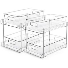 three clear drawers are stacked on top of each other