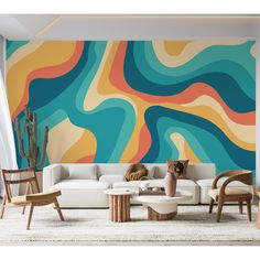 a living room filled with furniture next to a wall painted in multicolored waves