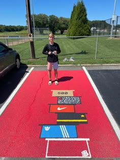 Batman Senior Parking Spot, Senior Year Parking Spot Ideas Boys, Boy Parking Spot Painting Ideas, Guy Senior Parking Spot Ideas, Parking Spot Painting Boys, Matching Painting Ideas