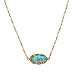 Stylish and finely detailed antique Art Nouveau watch chain necklace crafted in 14k yellow gold (circa 1900s to 1910s).  Originally a watch chain, the floral embossed and turquoise set ornament is a unique feature of the chain. Measuring 16 1/2 inches the chain sits nicely as a choker style at the nape of the neck. We recently added an 8mm ring that clips to the dog clasp and allow charms or pendants to be added to the chain to create your own unique look. The necklace is in good condition with patina evident. Note: previous repair evident to the chain.  Particulars:  Weight: 8 grams  Stones: N/A  Size & Measurements: The necklace measures 16 1/2 inches in length. The turquoise ornament measures 3/4 x 1/2 inch.  Metal & Hallmark: 14k yellow gold. The chain is not hallmarked though it has t Elegant Turquoise Locket Jewelry, Elegant Yellow Gold Turquoise Necklace With Cabochon, Gold Oval Turquoise Gemstone Necklace, Elegant Yellow Gold Turquoise Cabochon Necklace, Formal Turquoise Engraved Jewelry, Antique Turquoise Gemstone Jewelry, Elegant Antique Gold Cabochon Necklace, Elegant Turquoise Cabochon Necklace, Elegant Gold Turquoise Necklace With Oval Pendant