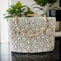 "Once upon a time, in the hands of a beloved grandmother, intricate lacework became a testament to the craftsmanship of bygone eras. Introducing the \"Vintage-Inspired Grandma's Lace Bag,\" a unique design adorned with special lacework that dates back 30-40 years--a true masterpiece that effortlessly blends the elegance of the past with the contemporary. Features: Timeless Elegance: Your grandmother's handcrafted lacework adorns the surface of the bag, with each detail serving as an expression of respect for the handicrafts of yesteryear. Durable Design: Crafted from high-quality materials, the bag not only offers sophistication but also practicality for everyday use. Functionality: The spacious compartments and showcase that the bag is not only elegant but also incredibly functional for d Bride Purse, Kiss Lock Purse, Lace Purse, Purse Wedding, Lace Bag, Lace Art, Wedding Purse, Bags Vintage, Evening Purse