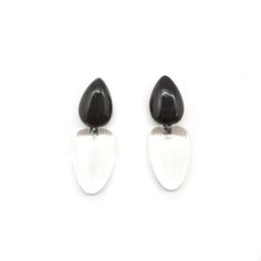 These clear resin and horn earrings are a modern style that can be worn dressed up or down. These are recommended as clip-on earrings however you may request them as posts. These measure 2 1/2 inches. Modern White Resin Earrings, Modern Clear Earrings For Formal Occasions, Modern White Clip-on Earrings, Elegant Clear Resin Earrings, Modern Lucite Earrings, Horn Earrings, Resin Earrings, Clear Resin, Post Earrings