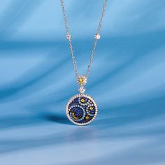 In a stunning display of style and craftsmanship, this necklace is brought to you. A combination of light blue, midnight blue, yellow gold, and white stones, the necklace is a premium miniature version of Van Gogh's timeless Starry Night painting. This piece of work reminds us to trust our dreams and not believe the critics of the world. "There is always hope, even in the darkest of times." So trust your dream and let this alluring jewelry make a statement.Carat Weight: 2.807 ctStone Size: 1,2,3 Blue Necklace With Detachable Round Pendant, Blue Diamond Pendant Necklace, Blue Necklace With Detachable Pendant In Fine Jewelry Style, Blue Cubic Zirconia Diamond Necklace Fine Jewelry, Blue Diamond Necklaces With Sparkling Stones, Fine Jewelry Blue Cubic Zirconia Diamond Necklace, Blue Sapphire Necklace With Sparkling Stones, Elegant Blue Necklace With Detachable Pendant, Dazzling Blue Necklace With Diamond Accents