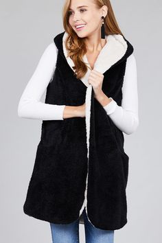 Stay nice and warm this winter in this super plush fluffy vest. It will feel like you are being hugged by a warm cloud. These run true to size. Fabric Content 100% POLYESTER Hooded Plush Outerwear For Winter, Sleeveless Vest With Fleece Lining For Winter, Winter Sleeveless Vest With Fleece Lining, Cozy Winter Vest For Cold Weather, Sleeveless Sweater Vest For Winter, Winter Sweater Vest For Cold Weather, Winter Sleeveless Sweater Vest For Cold Weather, Fluffy Vest, Vest With Pockets