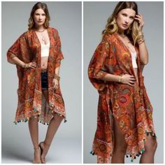 Rust Intricate Jacobean Print With Border Featuring Mini Tassel Lightweight Kimono Wrap With Side Slits. Approx. L 39" X W 40.5" Tassel: 1" Material: 100% Cotton Our Boutique Is Filled With A Curated Collection Of Styles: Spell Gypsy Boho Bohemian Hippie Retro Vintage Handmade Coachella Festival Free People Anthropologie Johnny Was Urban Outfitters Western Aztec Tribal Floral Vacation Fall Winter Spring Summer Casual Mumu Cocktail Love Lemons Coat Jeans Pants Top Dresses Shirts Cocktail Party Ro Beach Kimono With Tassels One Size, Spring Kimono With Tassel Ties, Vacation Kimono With Tassels One Size, Summer Kimono With Tassels, One Size Tassel Kimono For Vacation, One Size Vacation Kimono With Tassels, Casual Beach Kimono With Paisley Print, Long Tasseled Kimono For Vacation, Orange Bohemian Cover-up For Festival