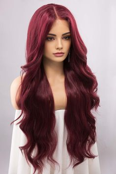 Color: Burgundy Red Texture: Wavy Wig Type: Lace Front Wig Length: About 30" Cap Size: 21"-22.5" Parting: Fixed Middle Part Material: Heat Resistant Fiber Lace Type: Swiss Lace Combs: 3 CombsDive into a captivating shade of Burgundy Red with this wig, reminiscent of a rich Wine color. Its wavy texture gracefully flows down to a considerable length of about 30", giving it a distinctive allure.The wig is thoughtfully constructed as a Lace Front Wig, with a Fixed Middle Part reinforced by hand-tied Burgundy Red Wig, Silver Blonde Ombre, Blonde Ombre Balayage, Red Texture, Ariel Cosplay, Mermaid Cosplay, Celebrity Wigs, Red Wig, Long Human Hair Wigs