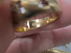 "A beautiful vintage 1970's wedding band, new old stock, never worn. This ring is done in solid 14kt. yellow gold. It is a chain link design, with the \"links\" being satin finish and the bottom of the shank a polished gold finish. 8 sparkling genuine diamonds are set in the top \"link\". Each diamond is 1mm across and is about 1 1/2points. They add just enough sparkle without being flashy. At its widest it measures 3/8\" north/south. Total weight is 5.6gms., and measures a size 6 on the ring ma Yellow Gold Diamond Ring With Hallmarks For Wedding, Gold Signet Ring With Diamond Accents For Wedding, Gold Signet Wedding Ring With Prong Setting, Gold Signet Ring With Prong Setting For Wedding, 1970s Wedding, Link Design, Palm Beach Fl, Initial Ring, North South