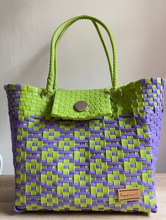 Handmade plastic handbag - Artisan made - Mexican handbag/purse - Handicraft bag  Super small business!  100% Handmade in Mexico. Braided bag made with love and recycled plastic hand-woven by Mexican artisan (my mom!).  Closes with a magnetic closure. - Snaps on the side - Includes 1 tassel*  - Each one is a unique model - Multicolor  - Washable - Original designs - Highly resistant recycled plastic * If you have a tassel preference, leave me a note with one or two options and I'll try to includ Multicolor Woven Bag With Double Handle, Purple Handwoven Bags For Daily Use, Eco-friendly Handwoven Bags With Double Handle, Mexican Bags Handbags, Wire Basket Ideas, Mexican Plastic Woven Bags, Plastic Handbag, Eco-friendly Multicolor Handwoven Bucket Bag, Mexican Bag