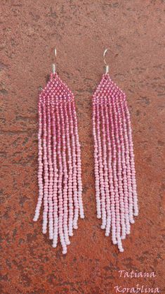 These unique handmade earrings are made of high-quality Czech beads and strong synthetic thread. They are elegant, fashionable, and highly versatile, suitable for everyday wear. Color:pink . 100% hand made with love! Measurements: Length-about 11.5cm (4.33 inch) Width -about 2 cm (0.79 inch) Materials: Sterling silver components Czech glass beads Nylon Thread Pink Chandelier Earrings For Summer Gift, Pink Long Drop Chandelier Earrings As Gift, Summer Pink Jewelry With Dangling Beads, Pink Beaded Dangle Earrings, Pink Bohemian Chandelier Earrings For Summer, Pink Tassel Earrings With Round Beads For Summer, Pink Tassel Beaded Earrings For Summer, Pink Beaded Tassel Earrings For Summer, Pink Dangle Beaded Earrings