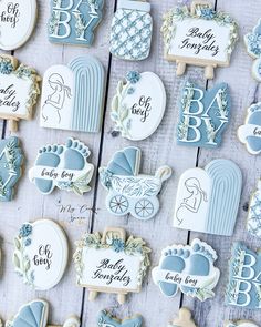 baby boy cookies are arranged on a table