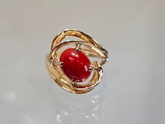 Circa 1985, a 14k yellow gold 9 x 7mm oval red carnelian cabochon ring size 6. Weight is 5.9 grams. Stamped 14k. Condition is very good. Thanks for looking.    ERA - Circa 1985, Vintage METAL / MATERIAL - 14k yellow gold  MARKINGS / HISTORY - Stamped 14k  CONDITION - The overall condition is very good! A true representation of 1980s-era jewelry! SIZE / MEASUREMENTS - 9 x 7mm oval red carnelian cabochon / size 6 / Weight is 5.9 grams. VINTAGE/ANTIQUE/HANDMADE - This item is VINTAGE. Add this timeless piece to your estate collection, to your wardrobe to jazz up any outfit, or gift it to an admirer of all things vintage and heirloom. Thanks for looking! DISCLAIMER - *Please note that the majority of vintage and antique items will reflect slight imperfections due to time, age, and previous use Red Cabochon Ruby Ring In 14k Gold, 14k Gold Red Cabochon Ruby Ring, Oval Cabochon Red Ruby Ring In 14k Gold, Red Ruby Oval Cabochon Ring In 14k Gold, Red Oval Cabochon Ring, Yellow Gold Carnelian Oval Cabochon Ring, Yellow Gold Oval Cabochon Carnelian Rings, 14k Gold Red Cabochon Ring, 14k Gold Cabochon Red Ring