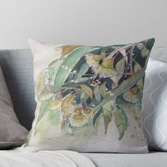 a watercolor painting of flowers on a white background throw pillow with green leaves and buds