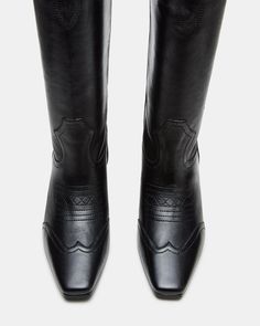 The DOLLIE Western boot offers a sleek and stylish design with a square toe. Experience comfort and durability with every step. Elevate your wardrobe with this timeless and versatile statement piece. 1.75 inch heel height Size 6 measurements: 15 inch shaft circumference, 13 inch shaft height Size 8 measurements: 16 inch shaft circumference, 14 inch shaft height Size 10 measurements: 17 inch shaft circumference, 14.75 inch shaft height Leather upper material Textile and synthetic lining Synthetic Classic Calf Leather Knee-high Boots With Square Toe, Classic Knee-high Boots With Block Heel, Classic Knee-high Heeled Boots With Medium Width, Classic Medium Width Knee-high Heeled Boots, Wide Calf Mid-calf Boots For Formal Occasions, Classic Wide Calf Knee-high Boots With Square Toe, Classic Wide Calf Boots With Block Heel, Classic Square Toe Knee-high Boots For Fall, Classic Knee-high Boots With Wide Calf And Square Toe