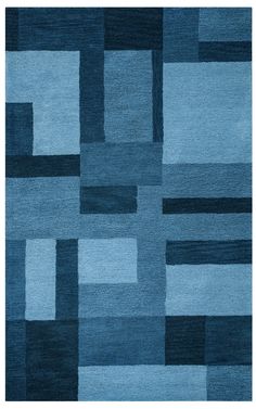 a blue rug with squares and rectangles on the bottom in various shades of blue